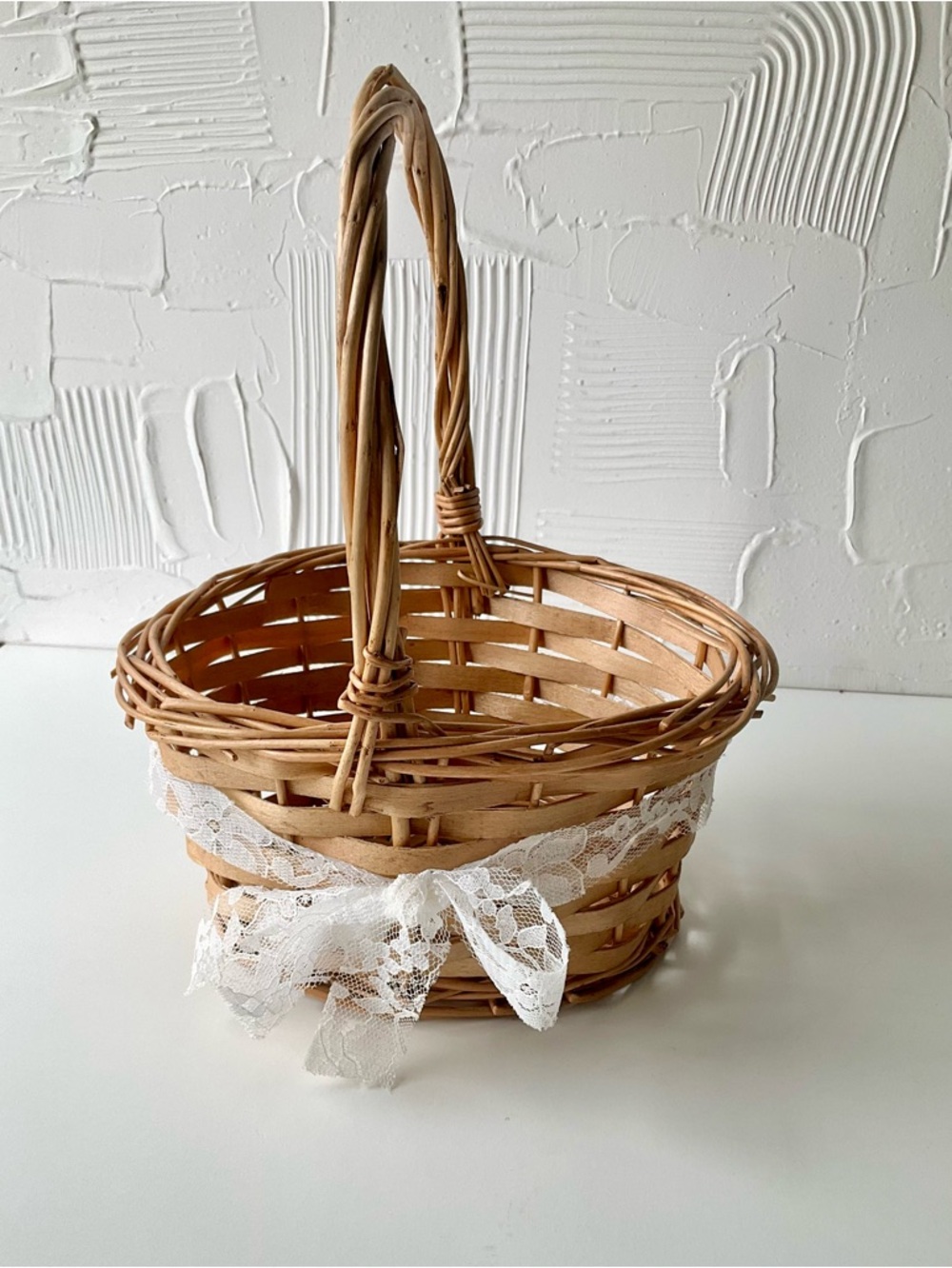 Boho-Chic Round Rattan Basket with Braided Accents